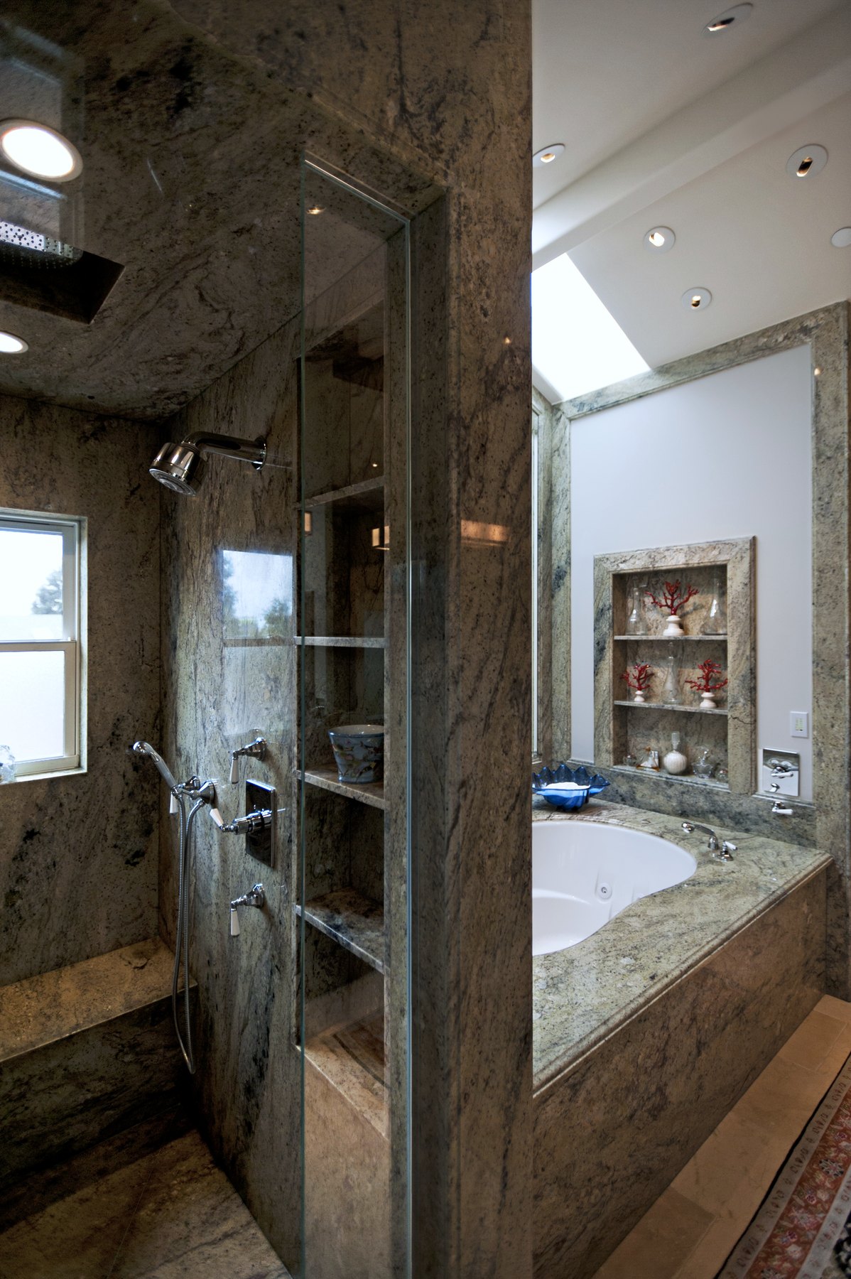 Stone shower opening to a soaking tub